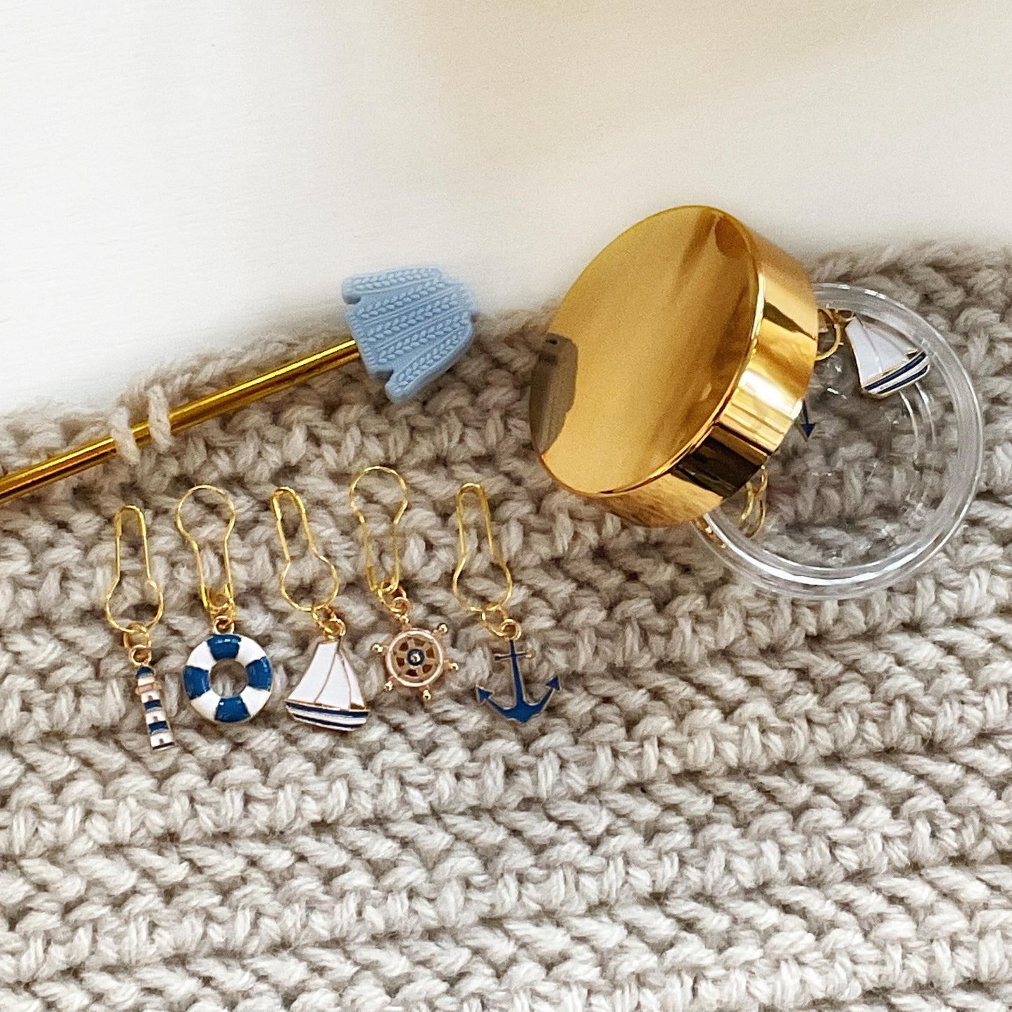 SAILING LOVERS stitch markers, 5 metal + enamel knit or crochet markers: boat, wheel, lifebouy, lighthouse, anchor + storage jar w/ lid