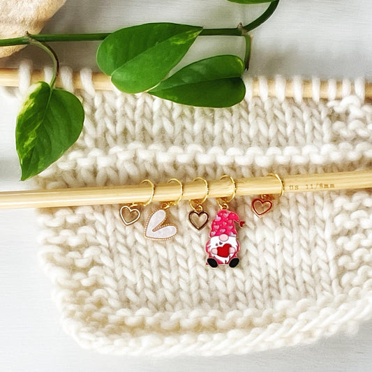 LOVE GNOME + HEARTS, Celebrate love + positivity with a set of 5 knit or crochet stitch markers includes plain pin + storage jar w/ lid