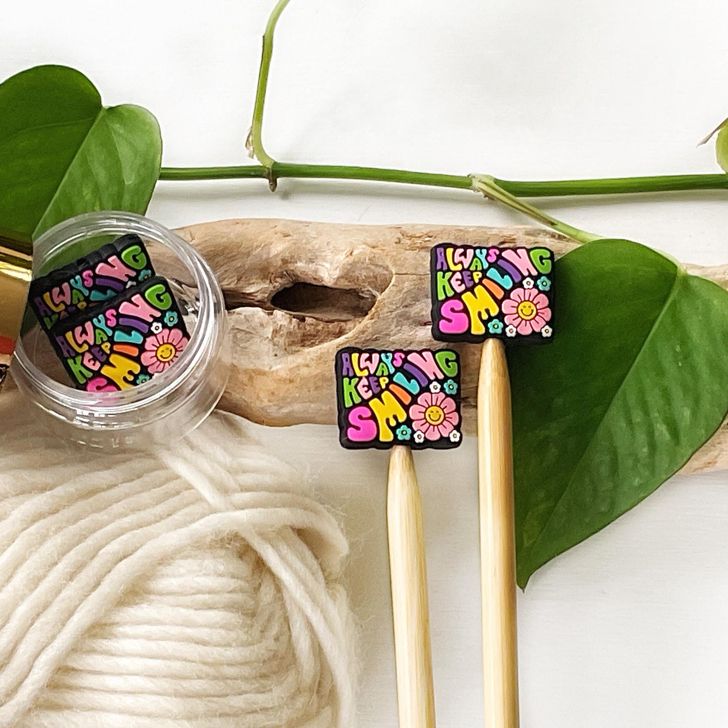 ALWAYS KEEP SMILING Funky seventies style colorful reminder w/smiling flowers, Set of 2 knitting needle point protectors, keep stitches safe