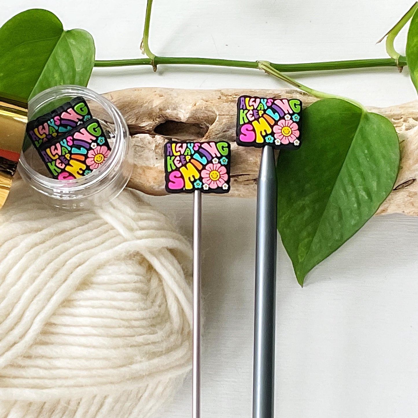 ALWAYS KEEP SMILING Funky seventies style colorful reminder w/smiling flowers, Set of 2 knitting needle point protectors, keep stitches safe